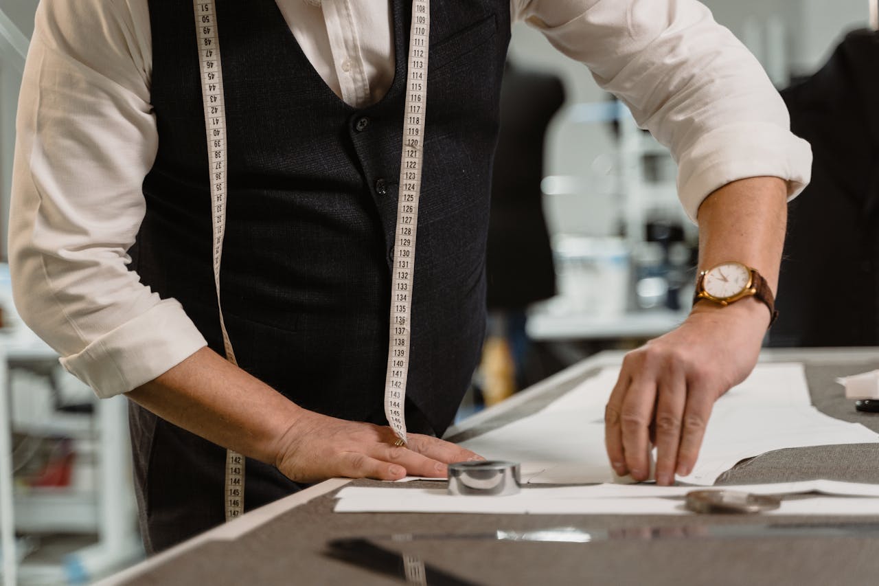 Person in White Dress Shirt and Black Vest